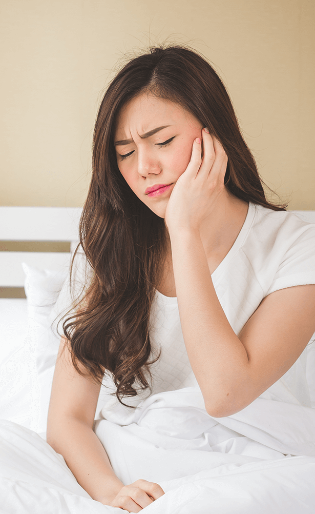 woman with tooth pain