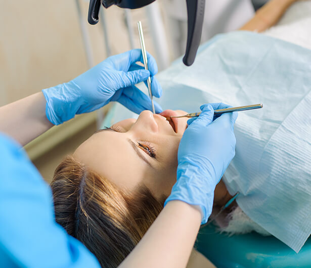 woman receiving a dental exam